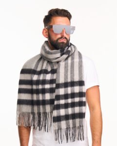 A grey checked cashmere scarf in a beautifully designed gift box.